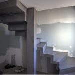 Escalier quart tournant entièremen,t recouvert de Béton Ciré