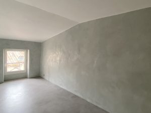 Mur d'une maison ancienne du Médoc en Béton Ciré