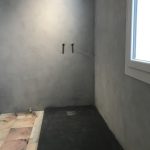 Béton Ciré sur les murs d'une douche
